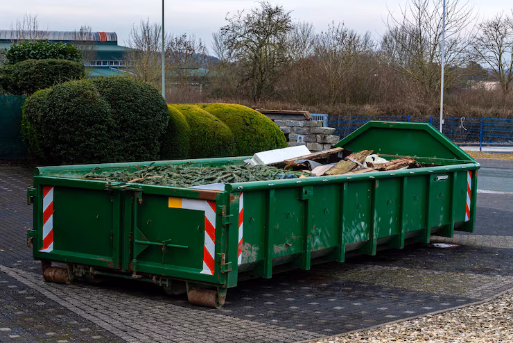 tractor-loading-mulch-truck